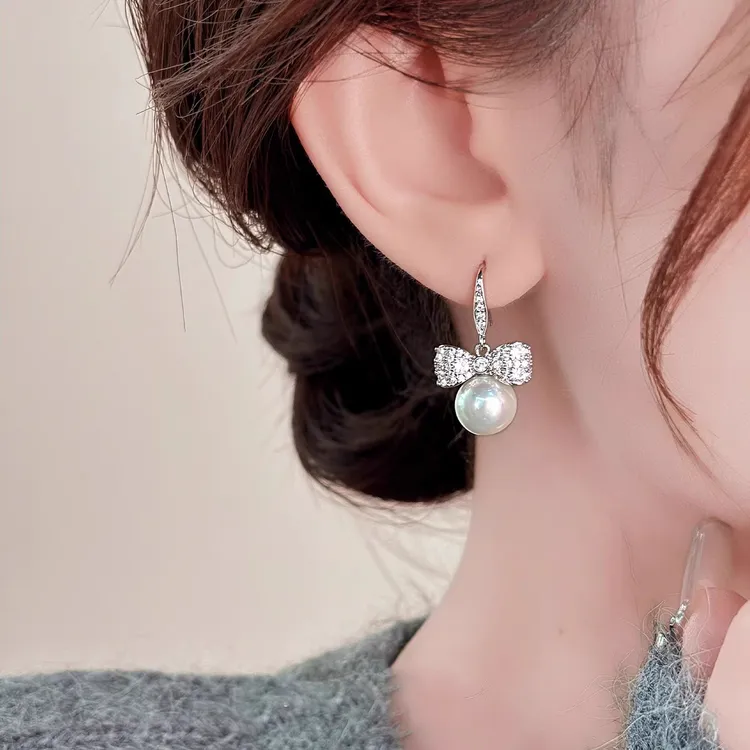 s925银满钻蝴蝶结珍珠耳环高级感轻奢耳坠女2025新款气质时尚耳饰