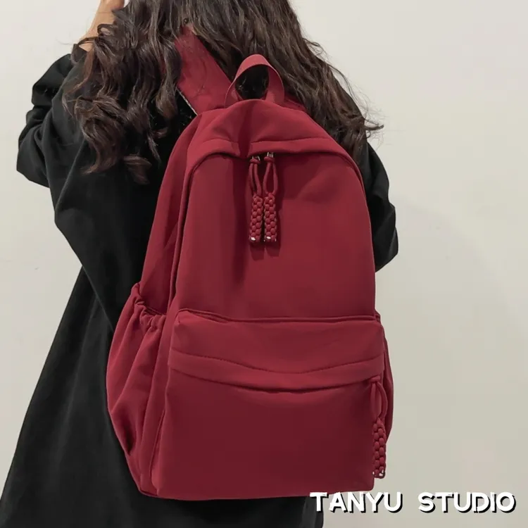 探屿百搭大学生旅行双肩包休闲背包男士简约纯色初中高中生书包女