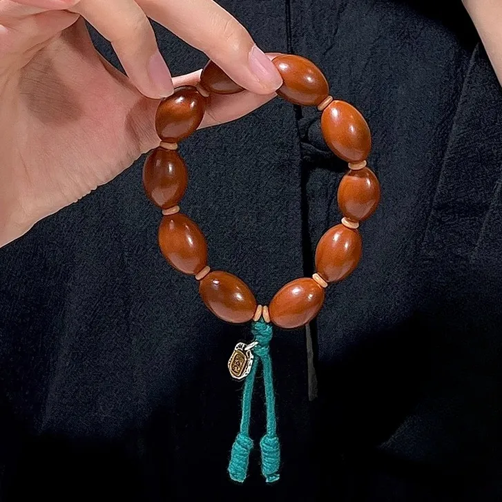 精品橄榄核光珠手串高密素核手工文玩天然核桃流苏手持男女手链