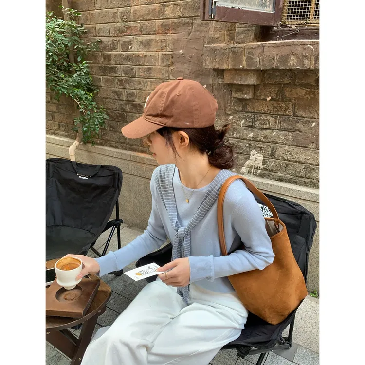 假两件披肩学院风长袖女2025年春季新款设计感小众温柔风百搭上衣