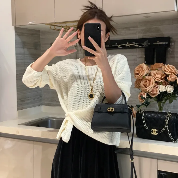 【七月】韩系设计感下摆提扣针织衫女秋冬新款百搭简约休闲纯色毛衣