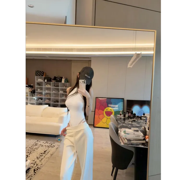 2025秋冬新款时尚高级感收腰无袖纯欲上衣配显瘦高腰休闲裤两件套