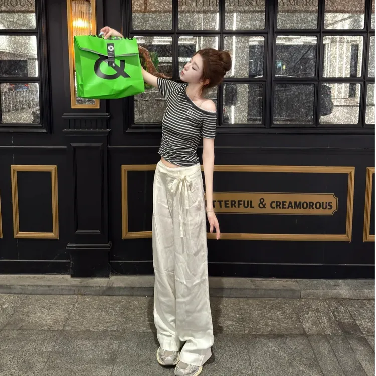 夏季新款网红洋气炸街女装小众条纹休闲百搭露肩上衣阔腿裤套装女