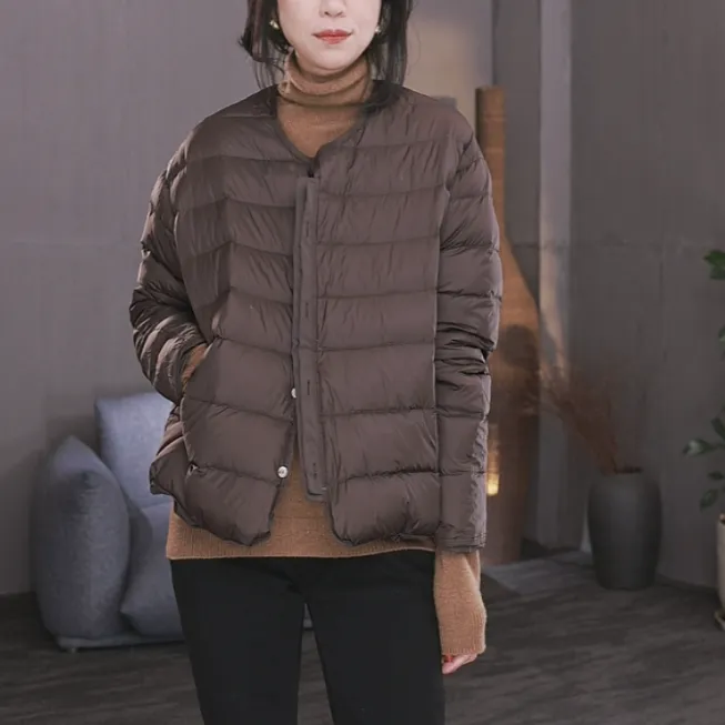 东倪MF 90白鸭绒排骨两面穿圆领泡芙感轻盈温暖短款羽绒服85D2507