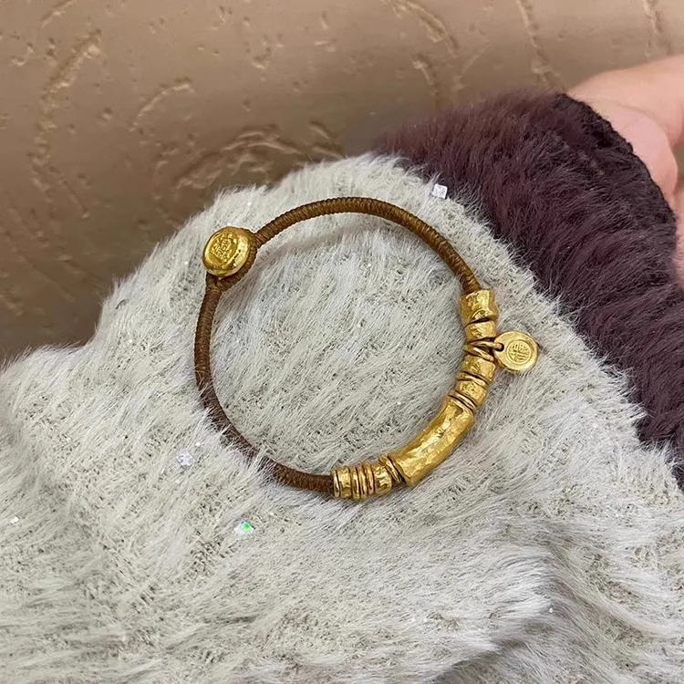 铜合金手链 黄金色手链女款2025年新款盘缠手绳海边度假风气质款 