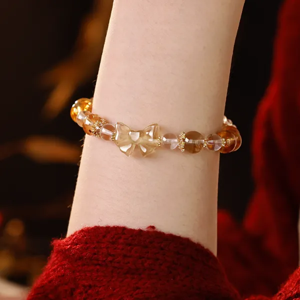 蝴蝶结天然黄水晶手串女款2025新款气质百搭精致单圈灵动优雅手链