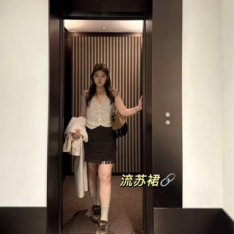 晶咕软软【巧克力少女】法式小众设计感时尚流苏显瘦包臀A字短裙