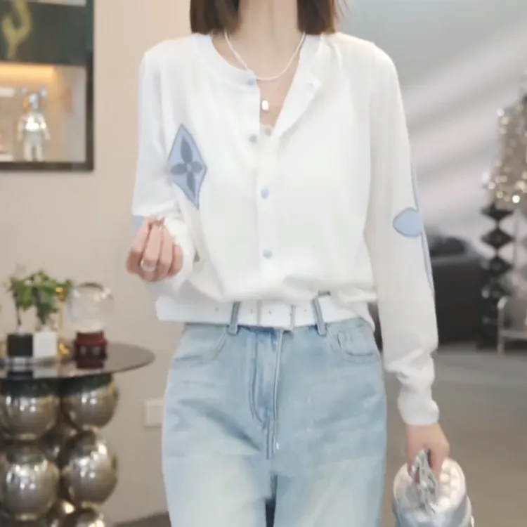 设计感撞色单排扣针织开衫女2025春季新款时尚休闲气质圆领毛衣