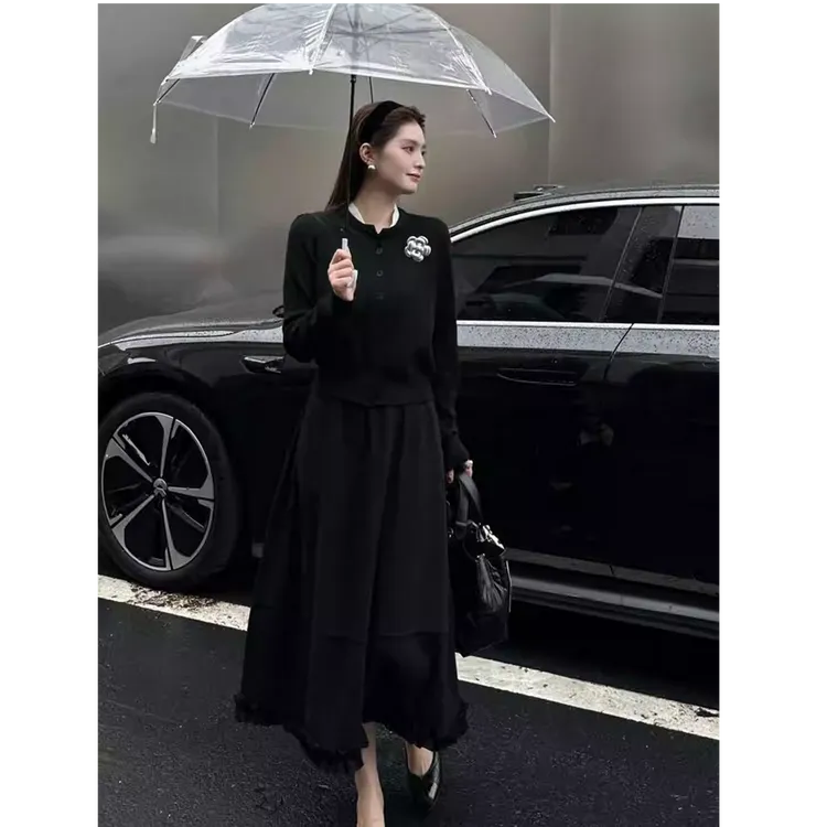 韩式轻奢风时尚气质黑色半身裙2025秋季新款木耳设计拼接A字伞裙