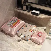 缎面kt猫化妆包可爱卡通印花收纳包高颜值外出旅游便携手提洗漱包