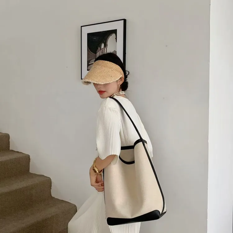 25新品帆布水桶包韩系简约通勤大包包休闲慵懒风百搭撞色单肩包