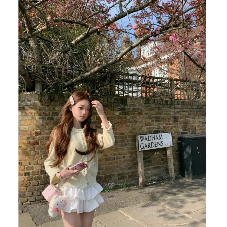 甜美辣妹时尚设计感气质长袖针织上衣女夏季2025新款显瘦短裙子潮