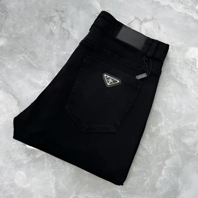春季新款三角标徽章加绒牛仔裤男士潮牌韩版直筒休闲修身黑色长裤