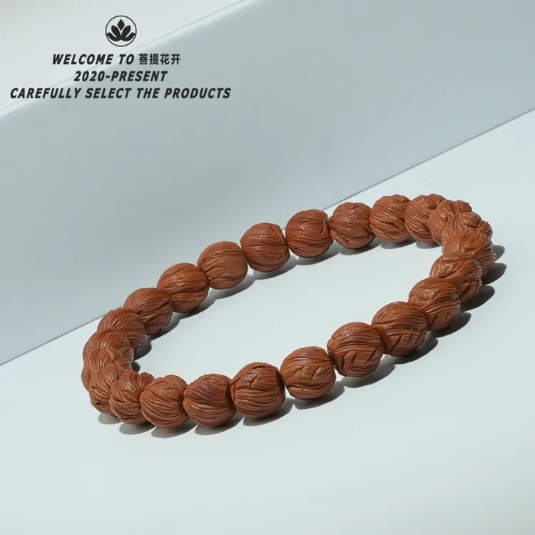 龙纹桃核【定风珠】尺寸10mm左右雕刻手串