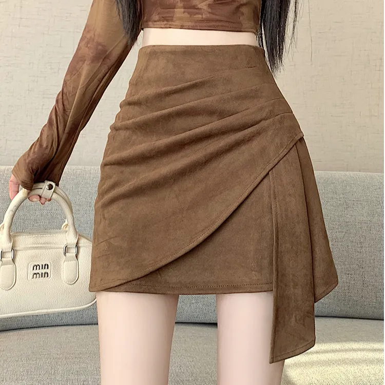 美拉德咖色麂皮绒半身裙女秋冬季2025新款不规则高腰a字包臀短裙