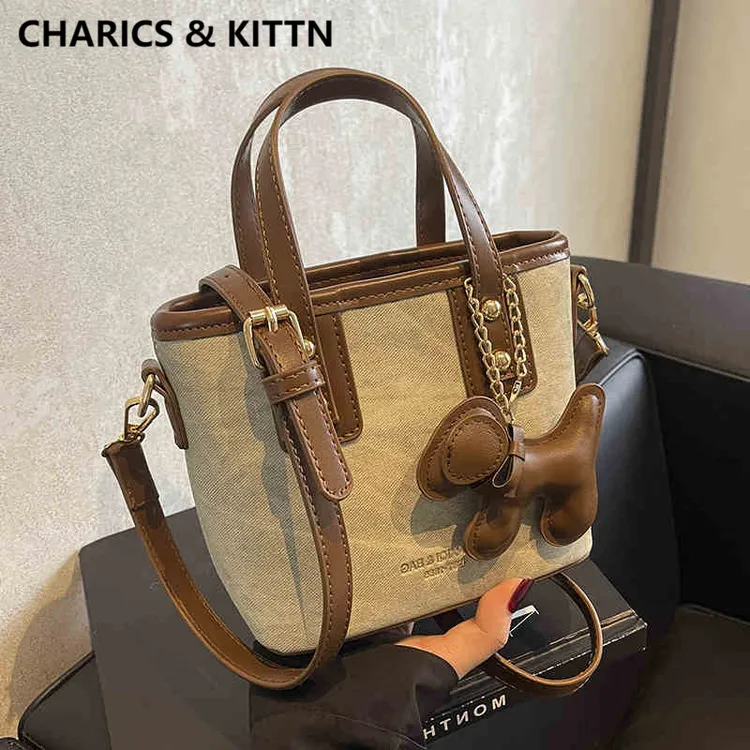 CHARICS&KITTN包包女新款2025小众高级质感水桶包真皮手提斜挎包
