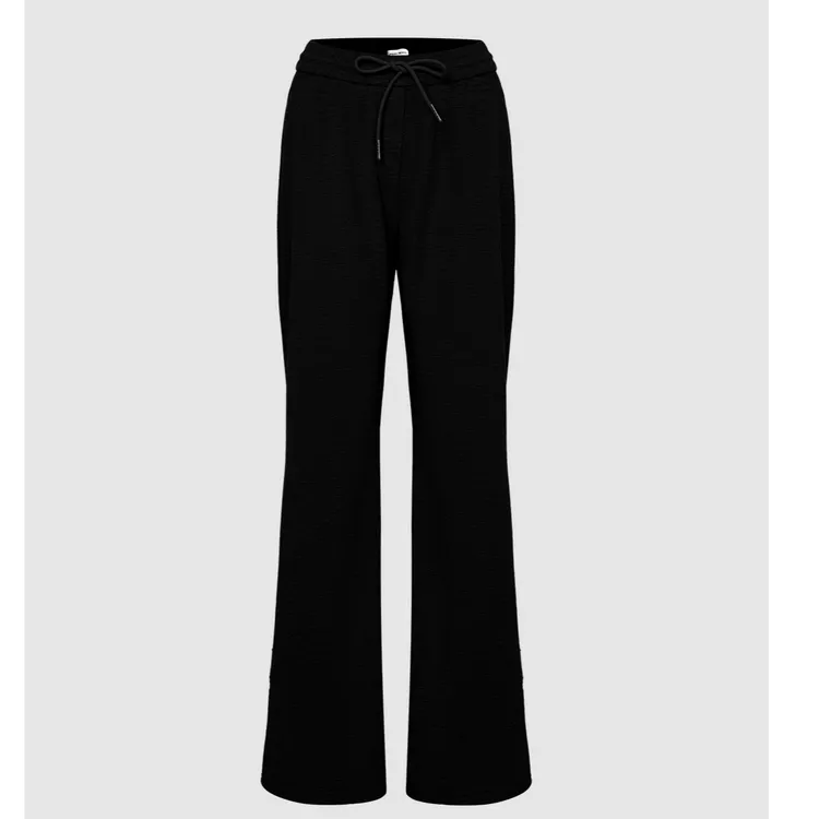 U某R新款女装简约休闲松紧腰抽绳剪标喇叭裤微喇