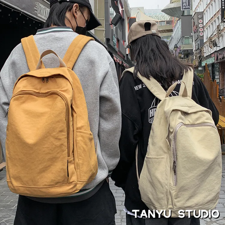 探屿原创帆布双肩包女大学生书包简约原宿高中生男旅行大容量背包
