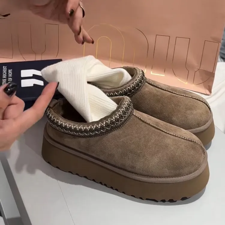 诗歌兰真皮女鞋2025冬新款时尚轻便迷你厚底增高保暖百搭雪地靴