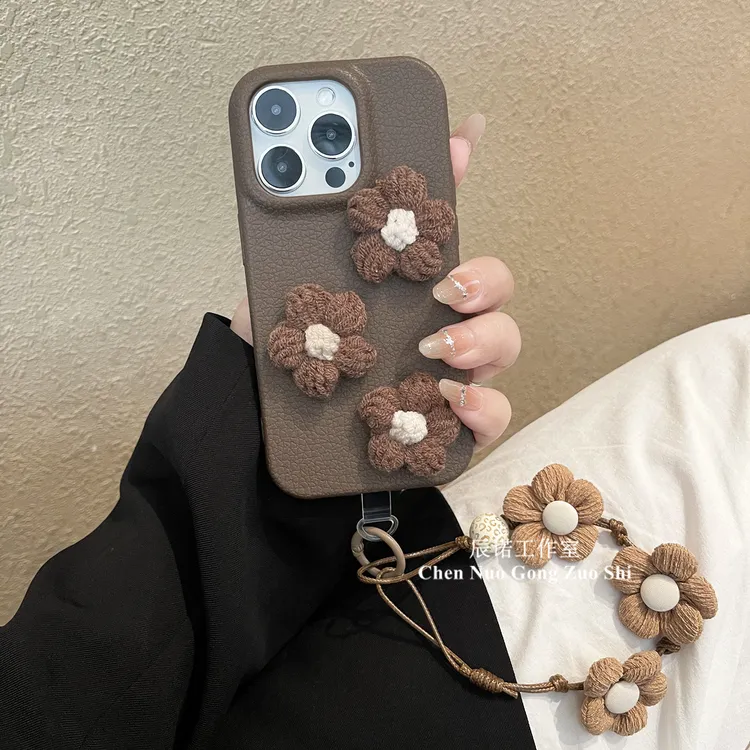 秋冬棕色毛绒花朵适用苹果华为荣耀oppo/vivo小米手机壳带手绳女