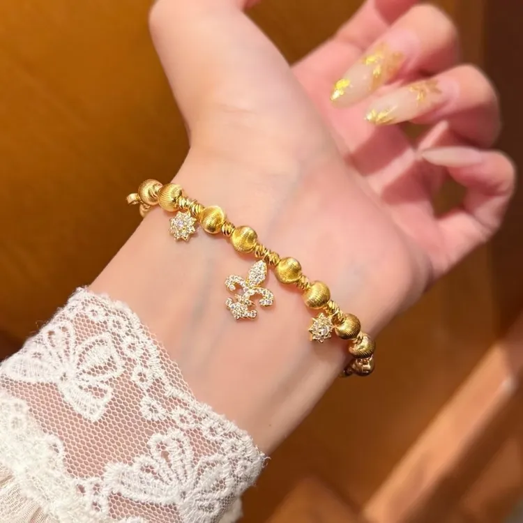 铜合金手链 新中式国潮风百搭高闪精致鸢尾花猫眼星芒手链