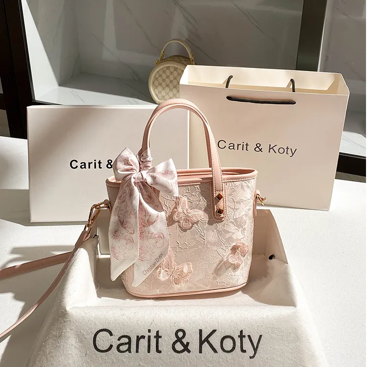 CARIT KOTY小众粉色菜篮子水桶包包2025新款百搭通勤高级感斜挎包