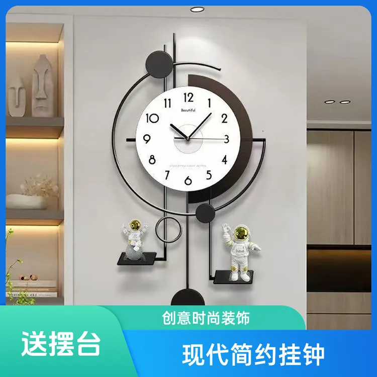 现代简约北欧风太空人挂钟家用金属圆形时钟客厅装饰