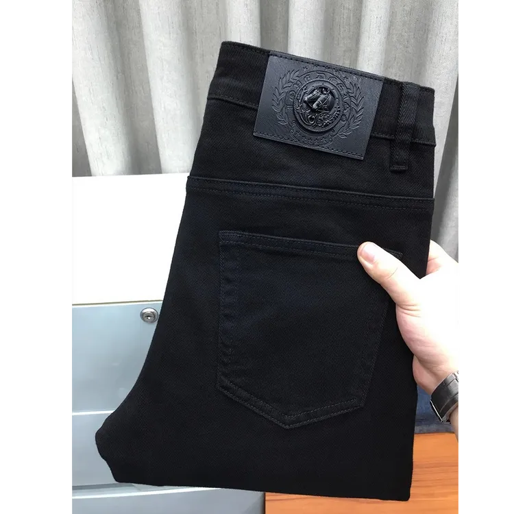 高端秋季黑色牛仔长裤男欧美潮牌弹力修身小脚休闲九分裤宽松直筒