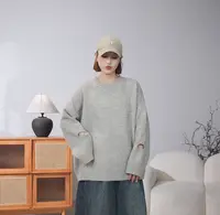 新款慵懒感拼接破洞圆领宽松毛衣