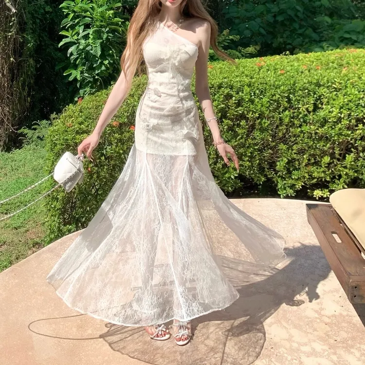 立体花朵网纱连衣裙女夏新款韩系纯欲气质收腰吊带鱼尾裙海边