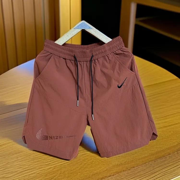 259夏季新款时尚百搭刺绣透气打孔休闲短裤