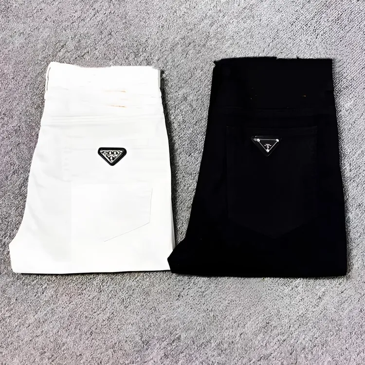 春季新款三角标徽章加绒牛仔裤男士潮牌韩版直筒休闲修身黑色长裤