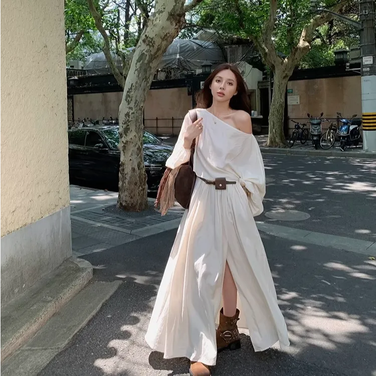 高级感气质套装女2025春季法式设计感露肩上衣开叉半裙两件套