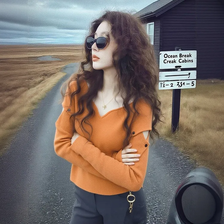 冬季韩里韩气穿搭轻奢高级感巨好看洋气减龄小众不撞款橙色针织衫