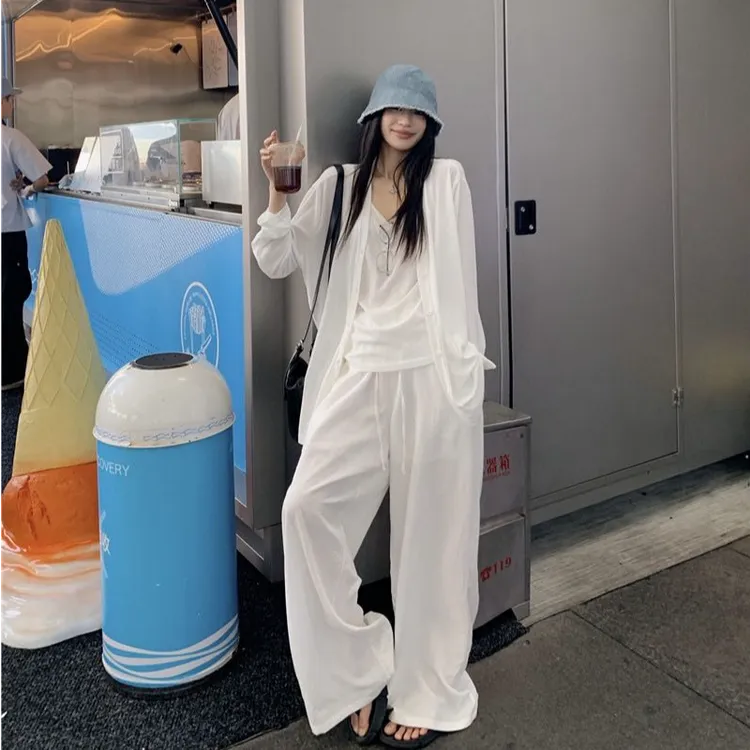慵懒风套装女夏季韩系白色吊带背心防晒针织开衫休闲阔腿裤三件套