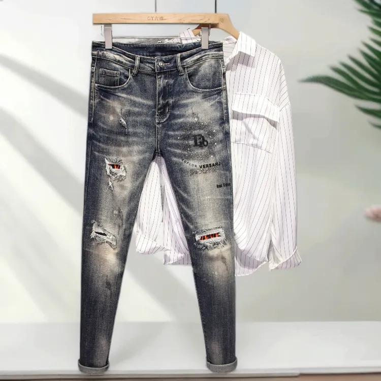 佩托本那轻奢秋季烫钻刺绣男士牛仔裤破洞修身弹力小脚休闲长裤
