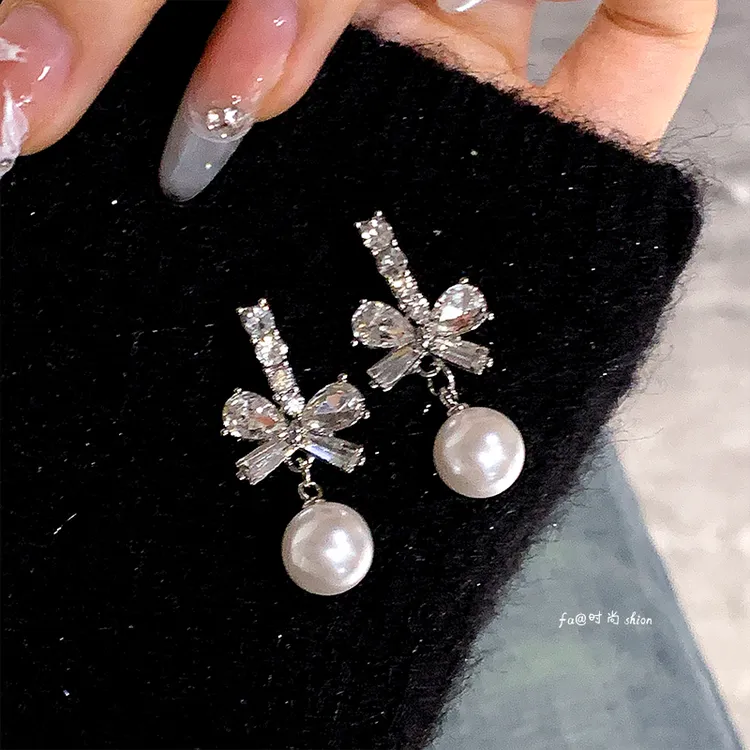 铜合金仿珍珠耳饰 气质蝴蝶结耳钉女新款小众设计感耳环甜美A83