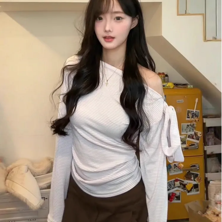 清新女大条纹斜肩长袖T恤女秋季甜辣修身打底绑带设计感露肩上衣