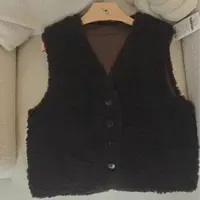 片断2024年秋冬马甲K4T099172W04