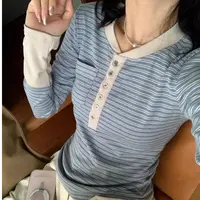 高端货~浅蓝色简约复古调性撞色半排扣条纹长袖t恤女宽松上衣
