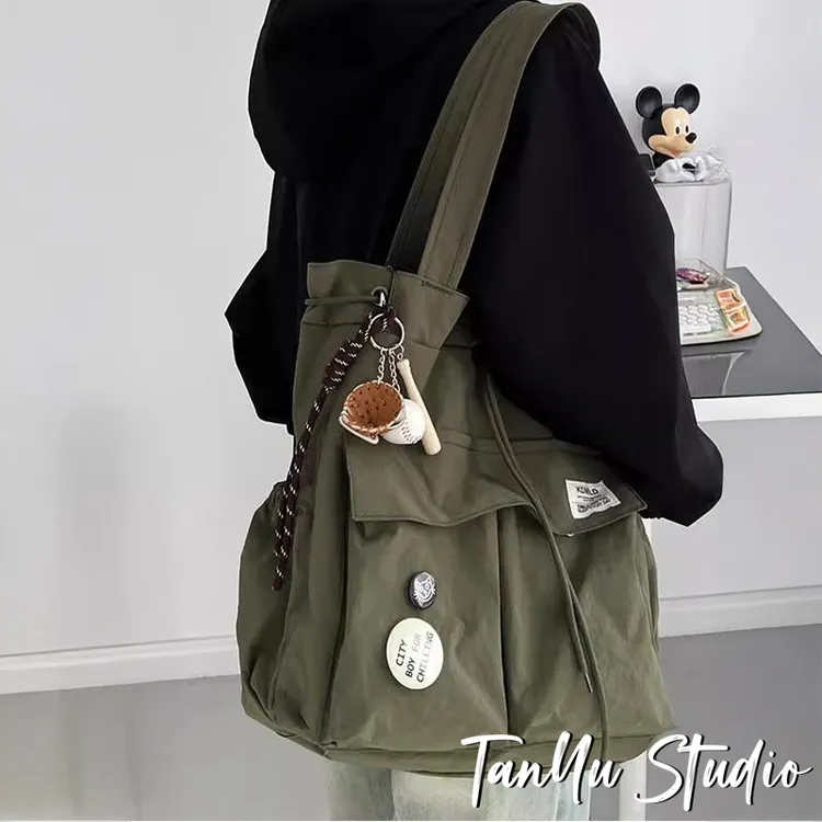 探屿女士斜挎包新款大容量潮牌双肩包男款学生可装书补课袋单肩包