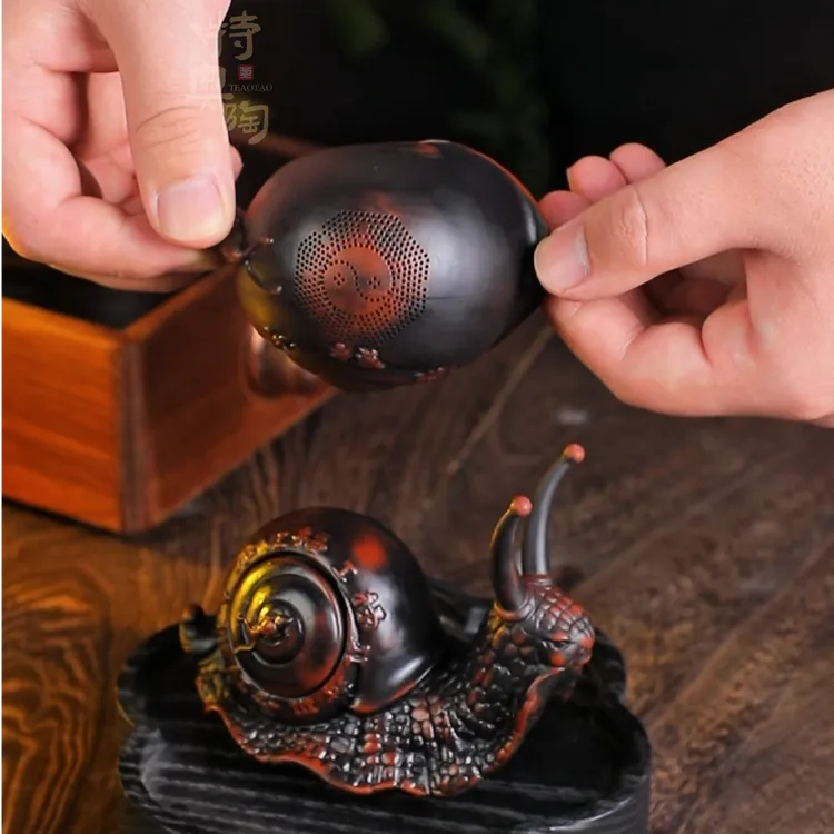紫陶蜗牛旋转茶漏摆件茶滤创意过滤盖置个性茶道摆设把玩茶漏架