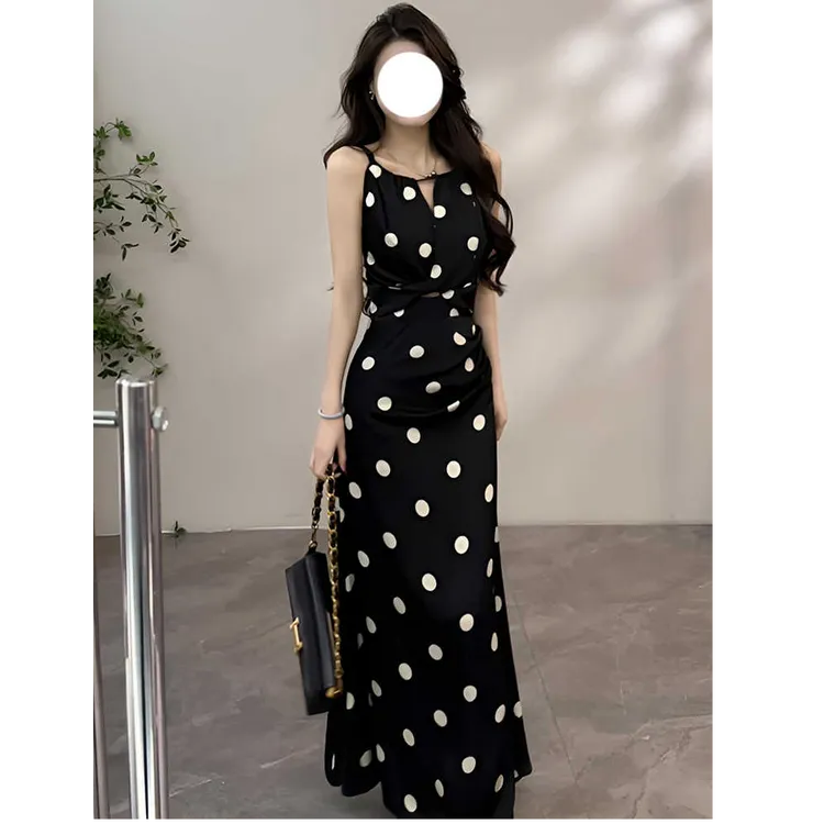 夏季新款度假风轻熟风气质女神吊带连衣裙显瘦百搭设计感波点长裙