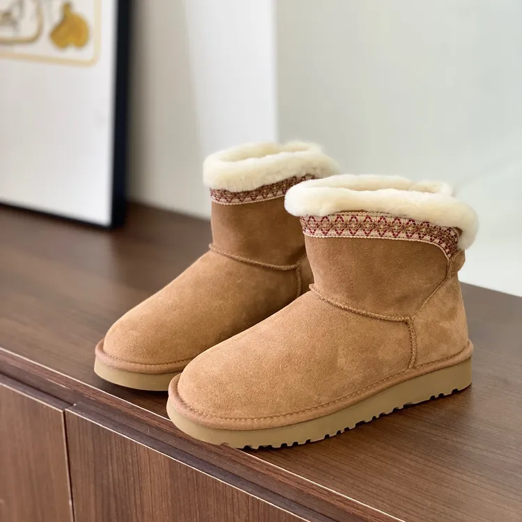 冬季增高雪地靴新款加厚中靴真皮羊毛皮毛一体防滑女款保暖DN4517