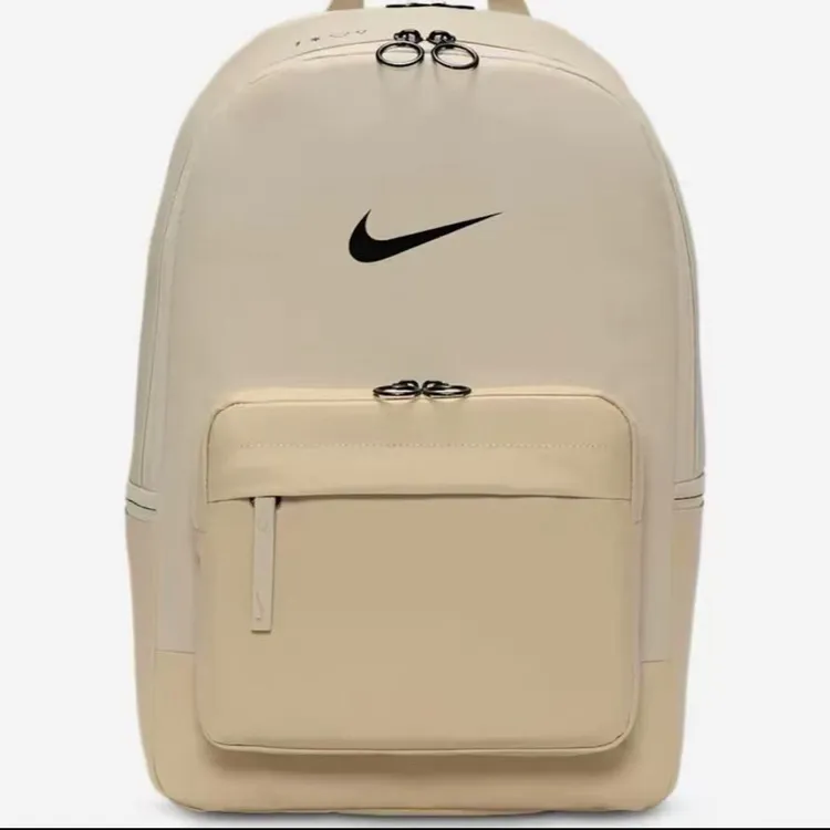 NIKE/耐克弧形肩带潮流通勤简约百搭双肩包DN3592-253
