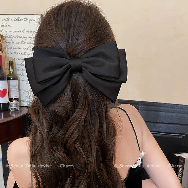 在逃公主大蝴蝶结发夹女2025新款高端后脑勺缎面半扎发弹簧夹头饰