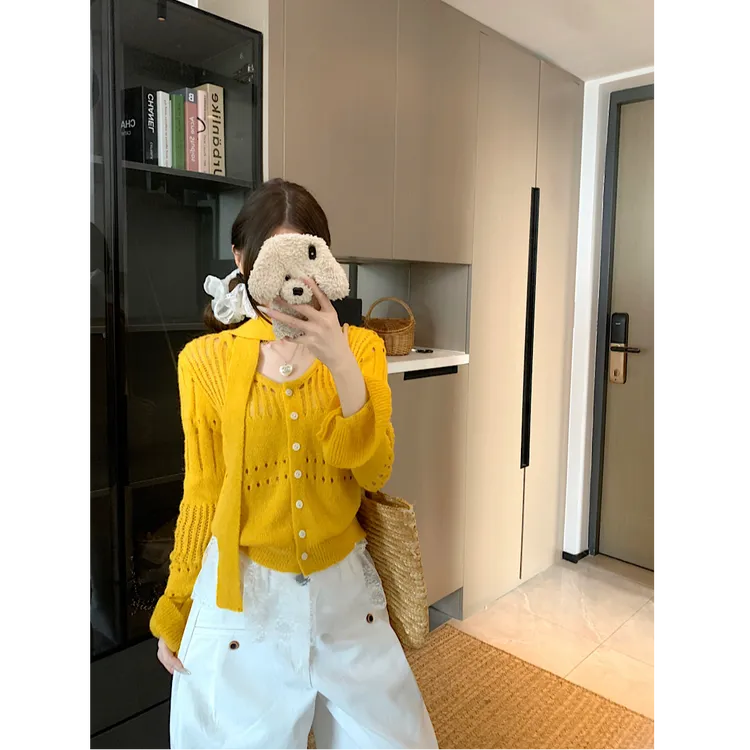 黄色气质法式镂空长袖针织开衫薄款设计感飘带女上衣