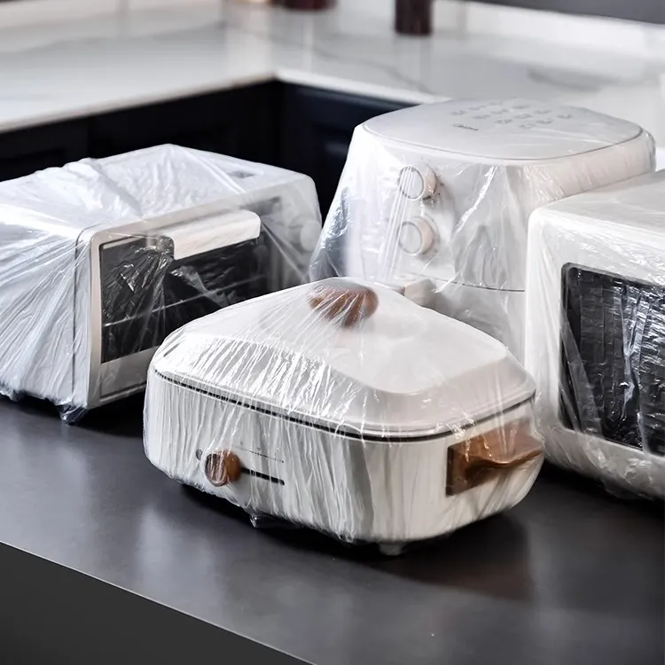 50个（新疆西藏包邮）一次性防尘罩透明厨房电器电饭煲家电保鲜膜