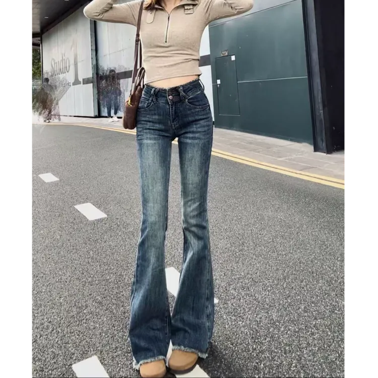 复古毛边腰排扣中腰微喇叭提臀修身牛仔裤百搭紧身弹力裤子女