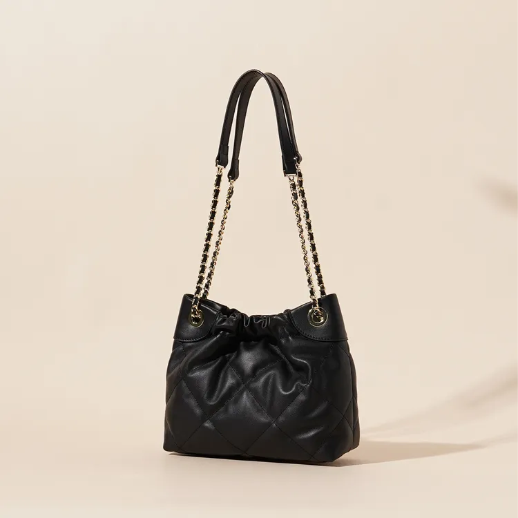 岩牛【小浩优选】新款时尚百搭简约经典头层牛皮垃圾袋包包YN3473